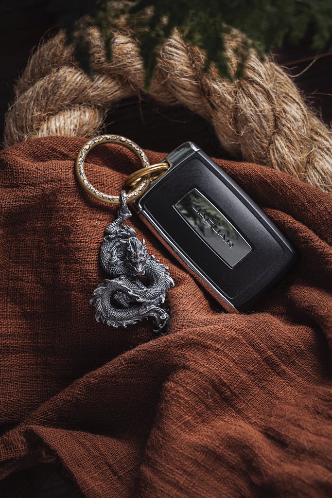 Dragon Keychain and Car Keys on Fabric